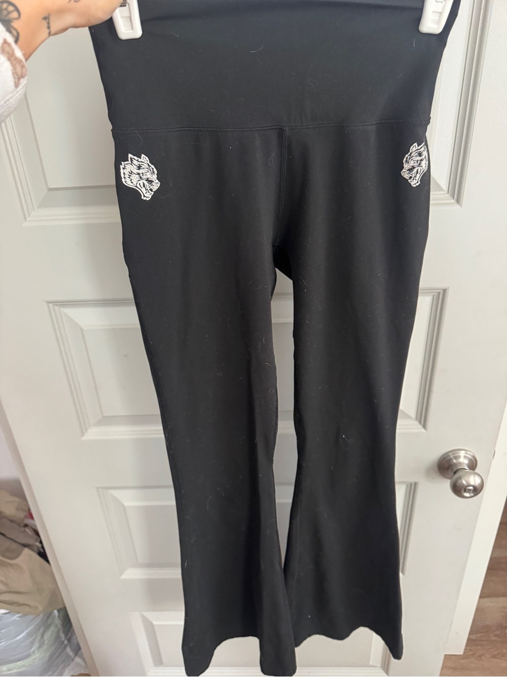 Darc Sport Black High-Waist Flare Leggings with Small White Wolf Logos
